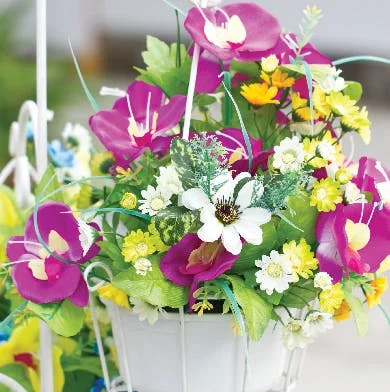 Silk flowers in hanging basket